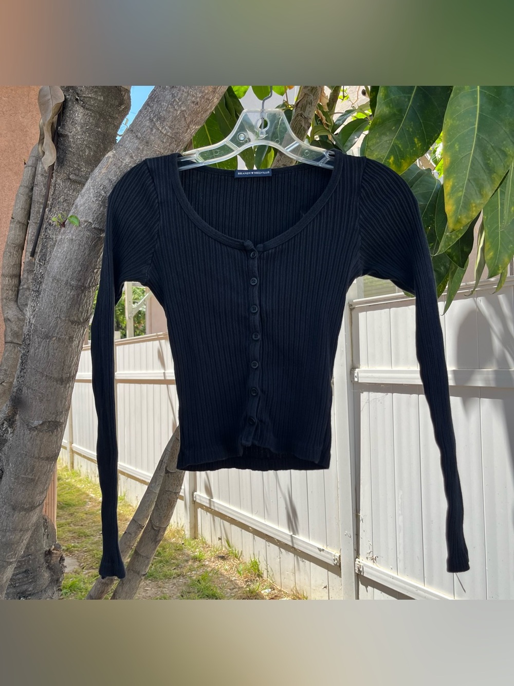 Brandy Melville Zelly Ribbed Long Sleeve Button Down Top in Black.